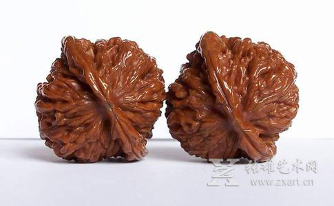 文玩核桃进入高仿时代 收藏要谨慎-张雄艺术网
