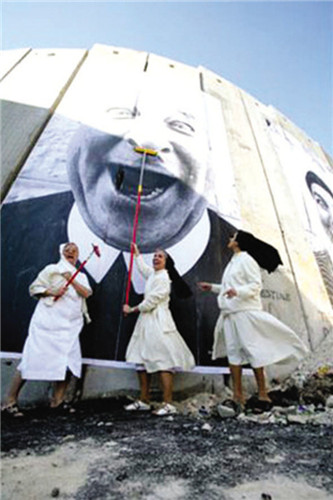 JR遍布全球的城市街头艺术作品